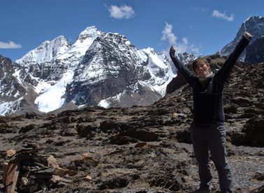 Trekker with views of Condoriri range Bolivia