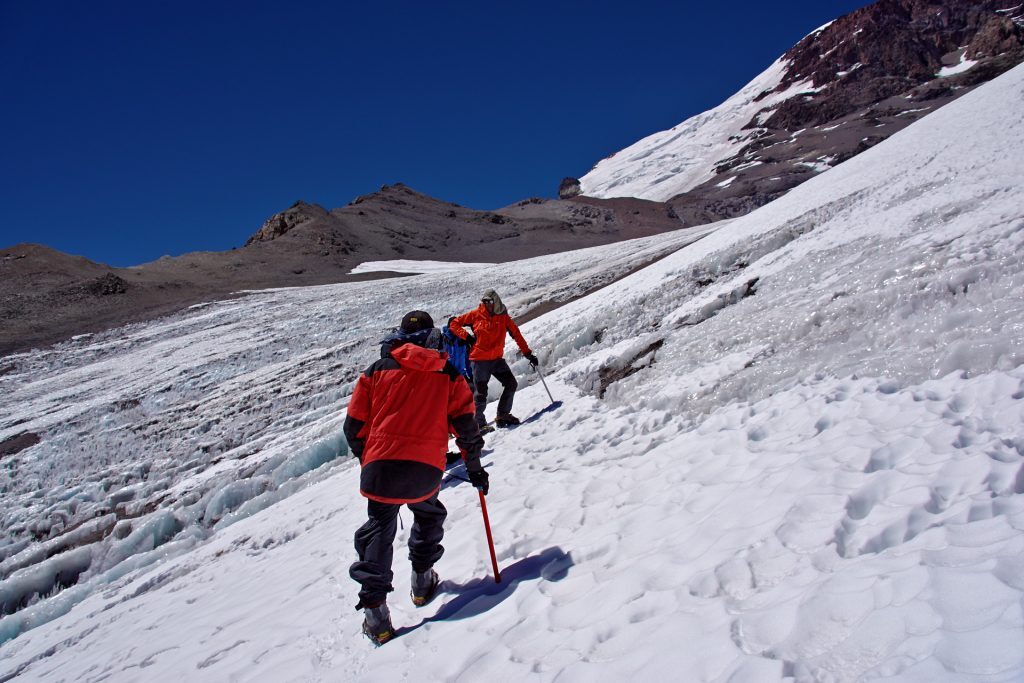 Snow slope with trekkers Aconcagua Argentina