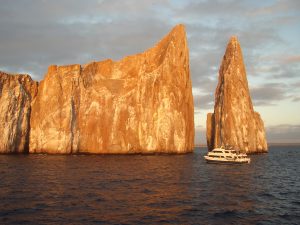 Sun lit Kicker Rock Galapagos