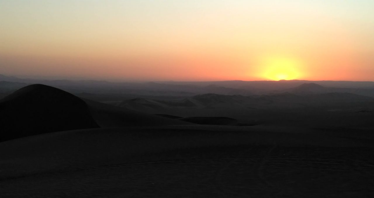 Dune dark sunset Huacachina Peru