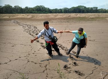 Tambopata Research Centre guide and mud and traveller, Peru