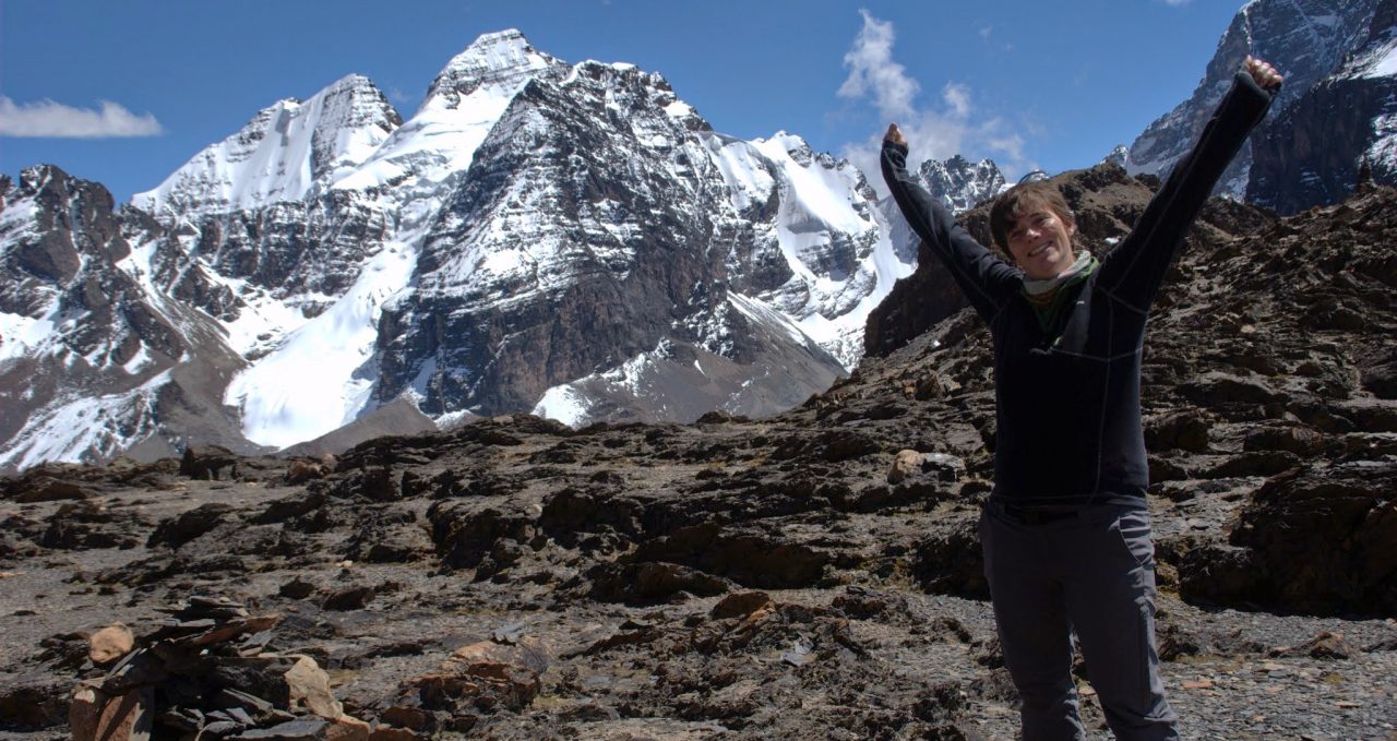 Trekker with views of Condoriri range Bolivia