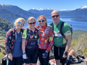 4 people in bright cycle jackets