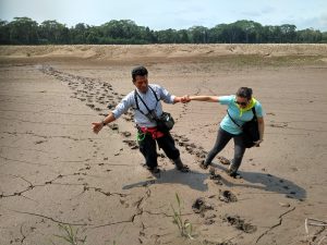 Tambopata Research Centre guide and mud and traveller, Peru