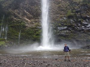 kid and waterfall on ecuador trekking trip